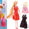 MELODY 27CM AVEC 4 ROBES DE SOIREE