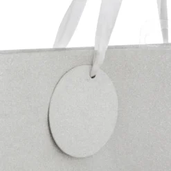 SAC CADEAU PAILLETTE ARGENT D.18X10X23CM