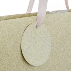 SAC CADEAU PAILLETTE OR D.26.7X13.7X33CM